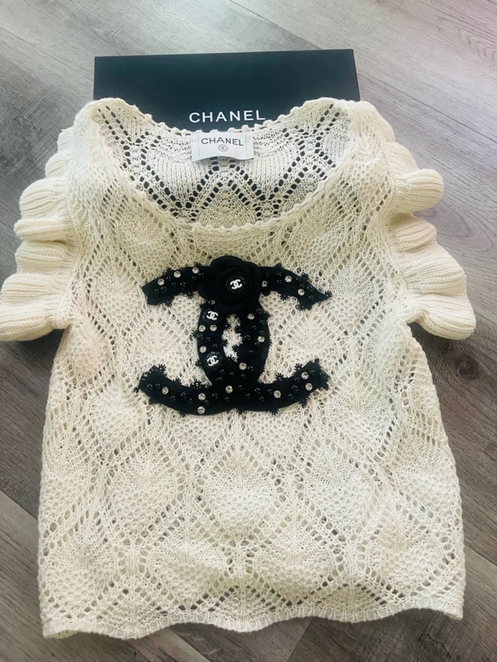 CHANEL Cream Openwork Knit Top with Black CC Appliqué SIZE S
