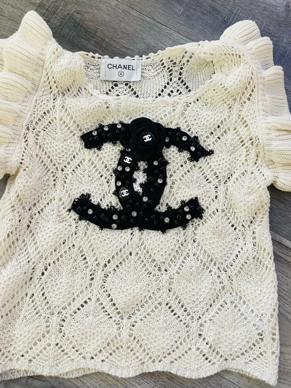 CHANEL Cream Openwork Knit Top with Black CC Appliqué SIZE S