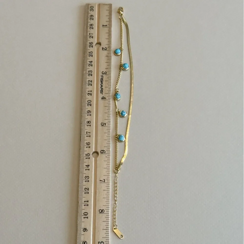 Anthropologie elegant gold