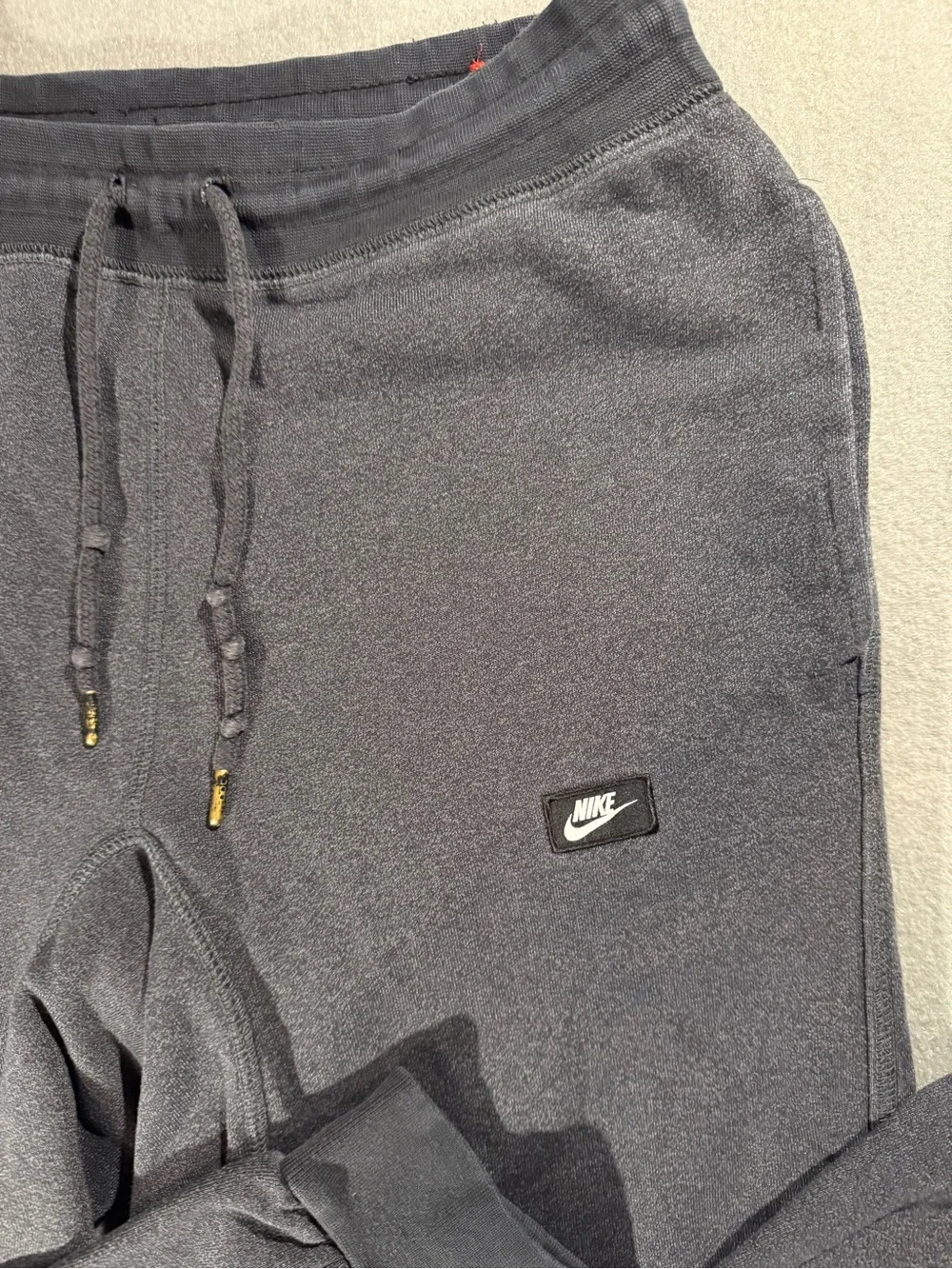 Nike Black Fleece Jogger Pants with Red Logo Tag