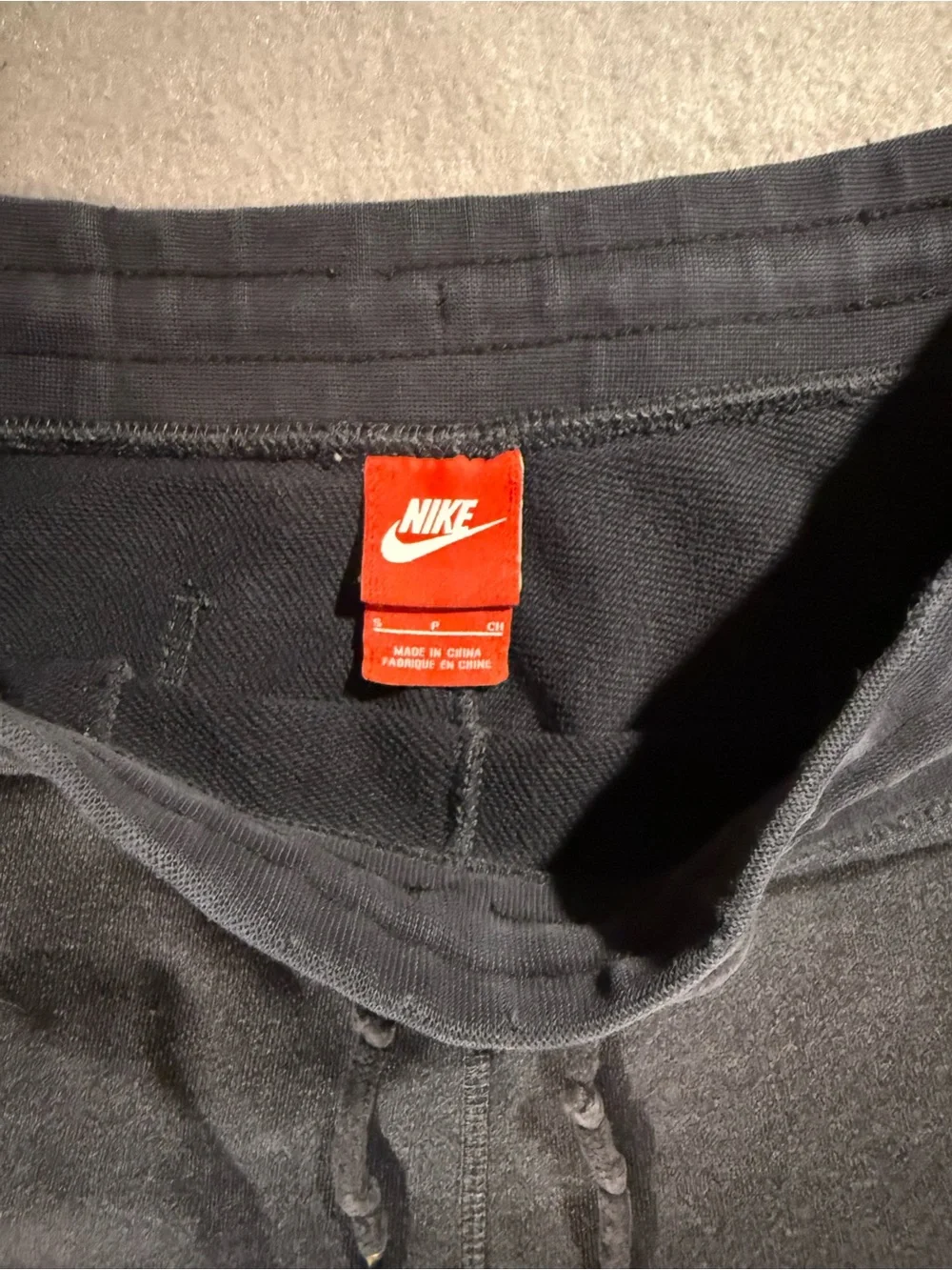 Nike Black Fleece Jogger Pants with Red Logo Tag