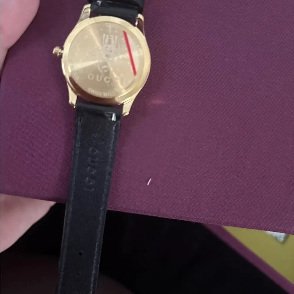 Brand new with box and dustbag Gucci Black and Gold Watch women's
