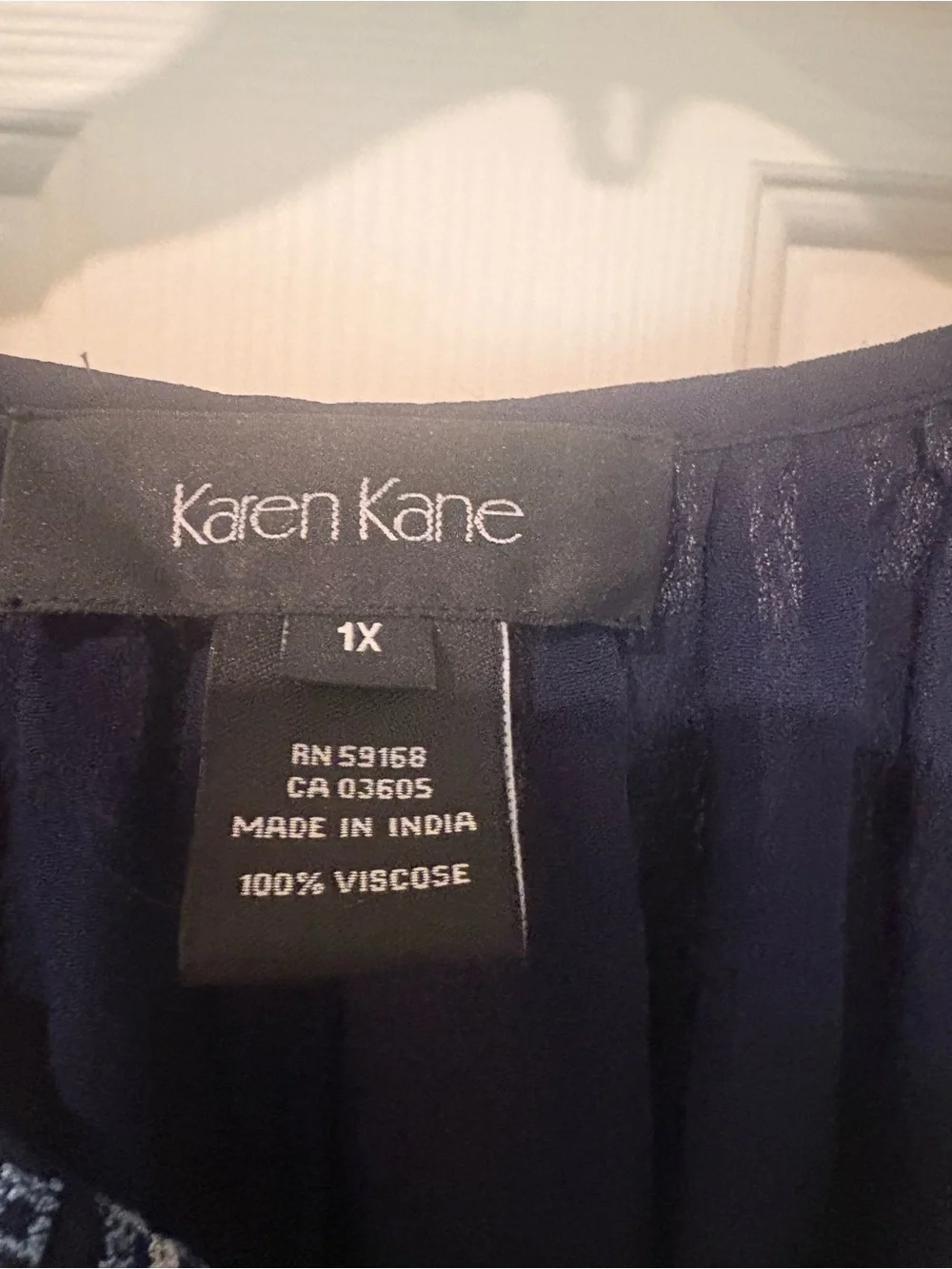 Karen Kane Navy Peasant Blouse with Light Blue Embroidery