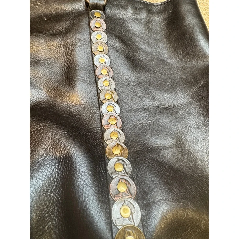 Patricia Nash one rivet