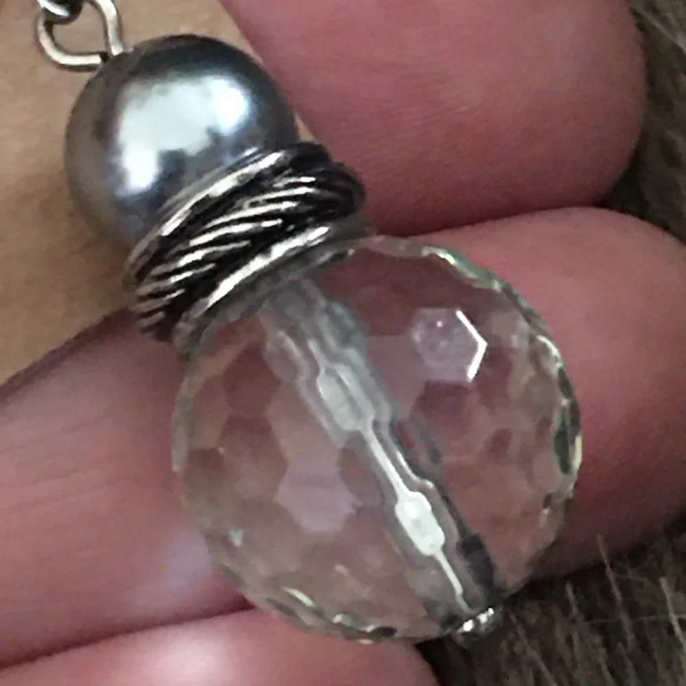 Faceted light blue glass silver tone lever backs