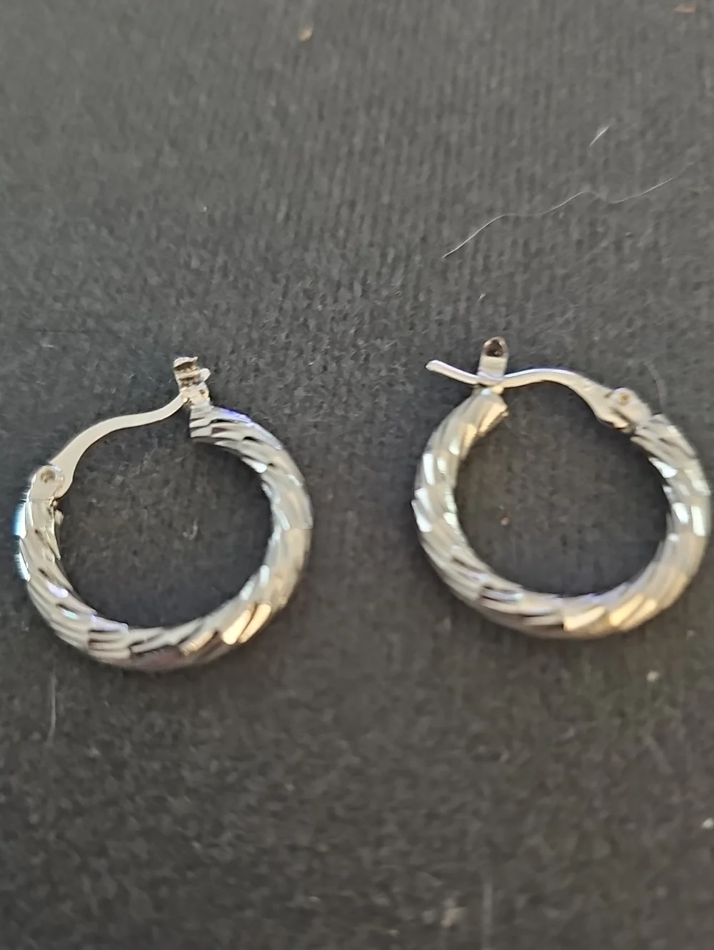Elegant Silver Twisted Hoop Earrings. 925 Sterling