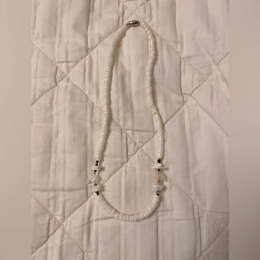 Dolphin Puka Shell Necklace