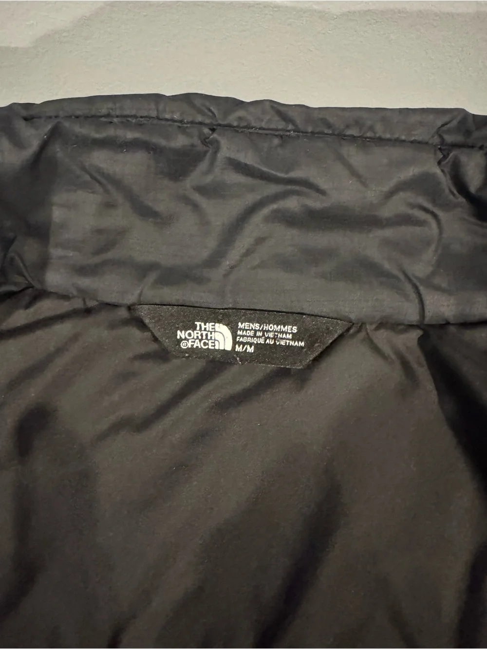 The North Face Black Puffer Vest with Chest Zip