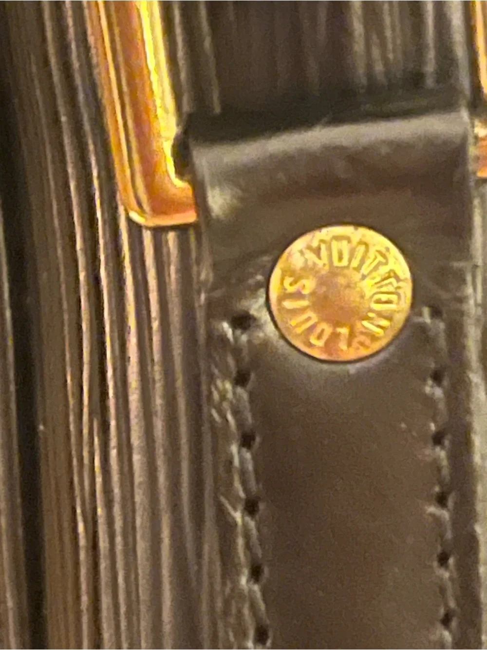 Louis Vuitton compact yet
