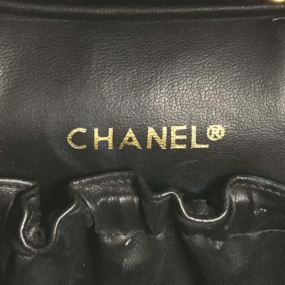 CHANEL black leather