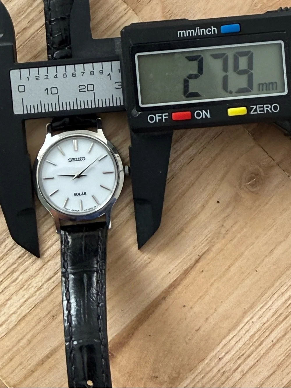 Seiko Solar Ladies Watch White Round Dial Black Leather Strap Stainless Case
