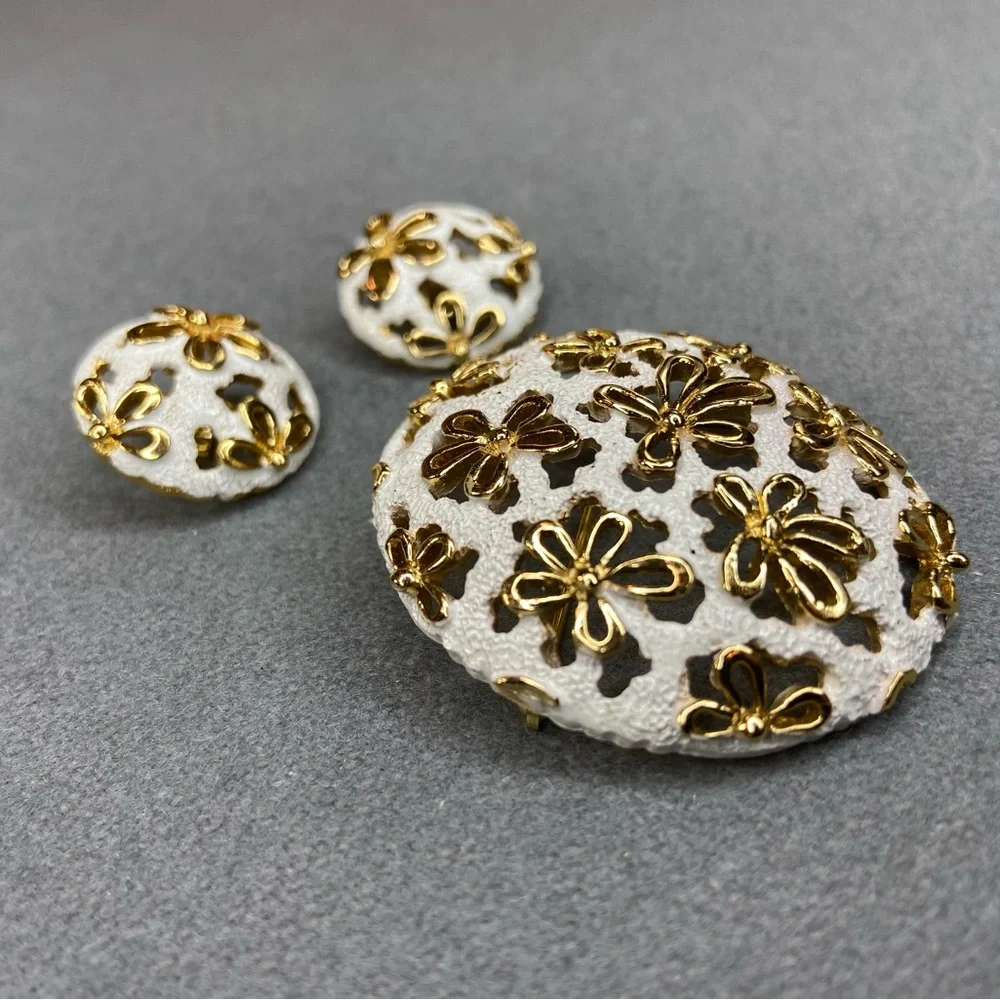 Trifari earrings brooch