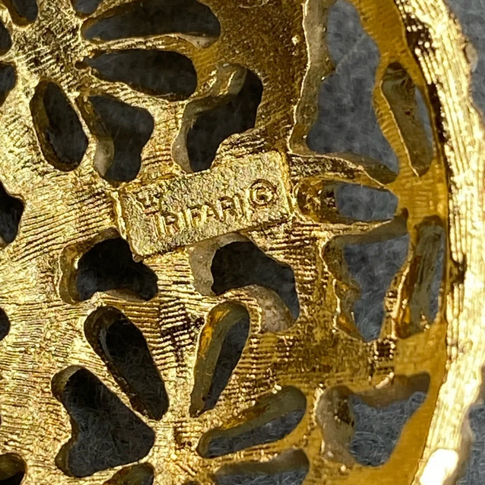 Trifari earrings brooch