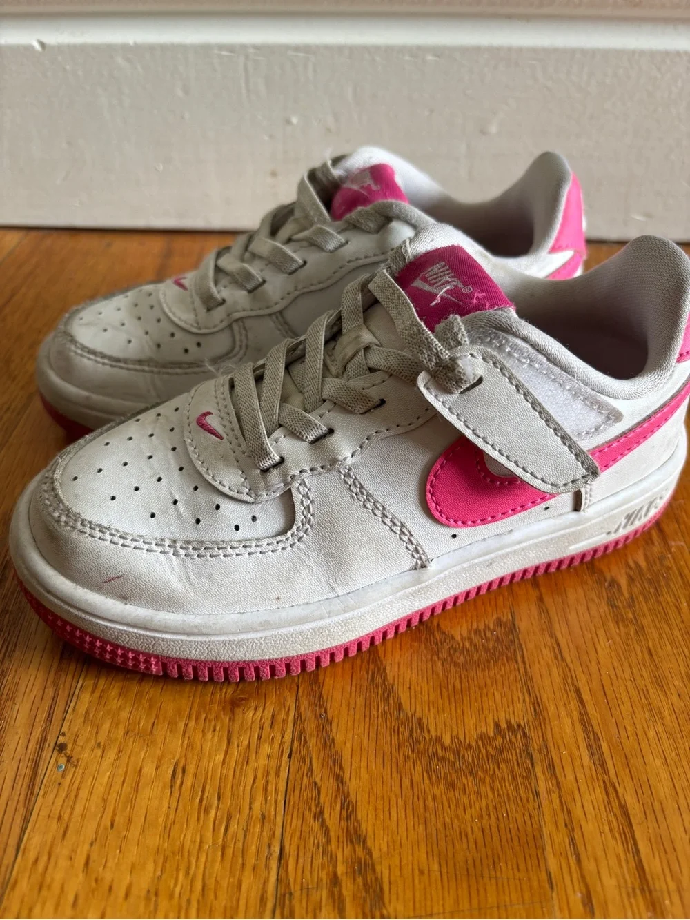 Nike White Low-Top Sneakers with Hot Pink Swoosh