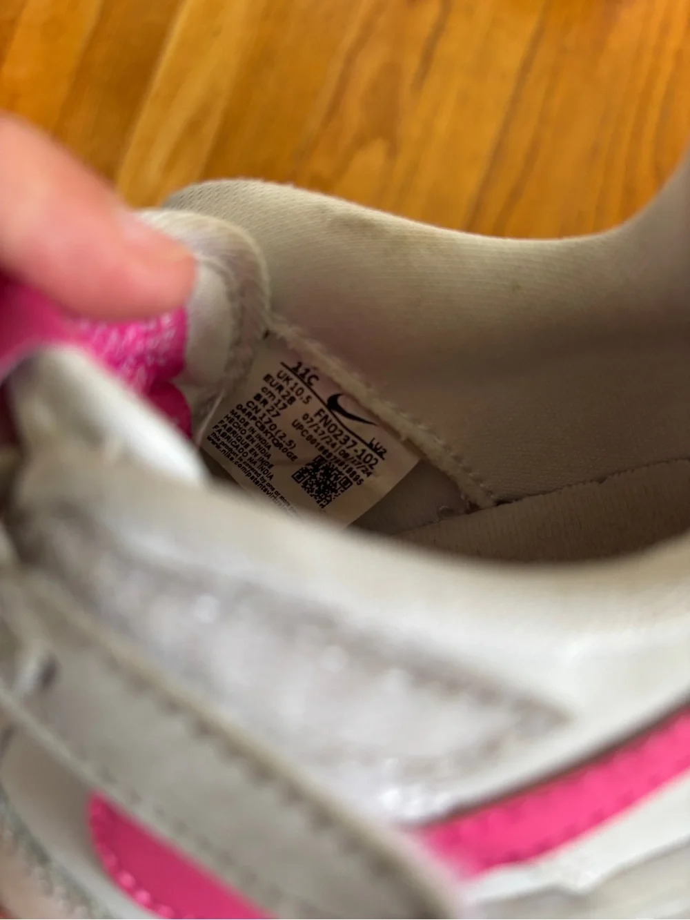 Nike White Low-Top Sneakers with Hot Pink Swoosh