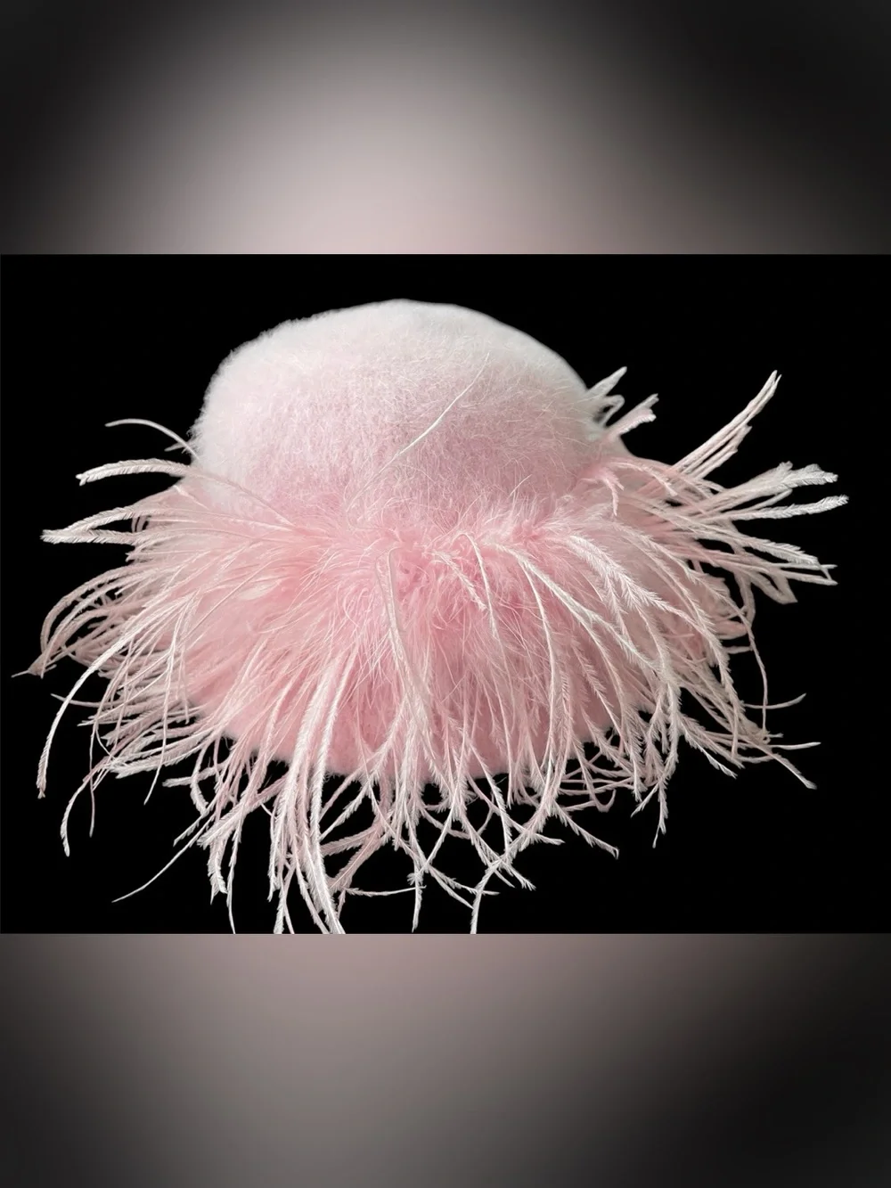 Pink C.C angora bucket hat with wispy fringe