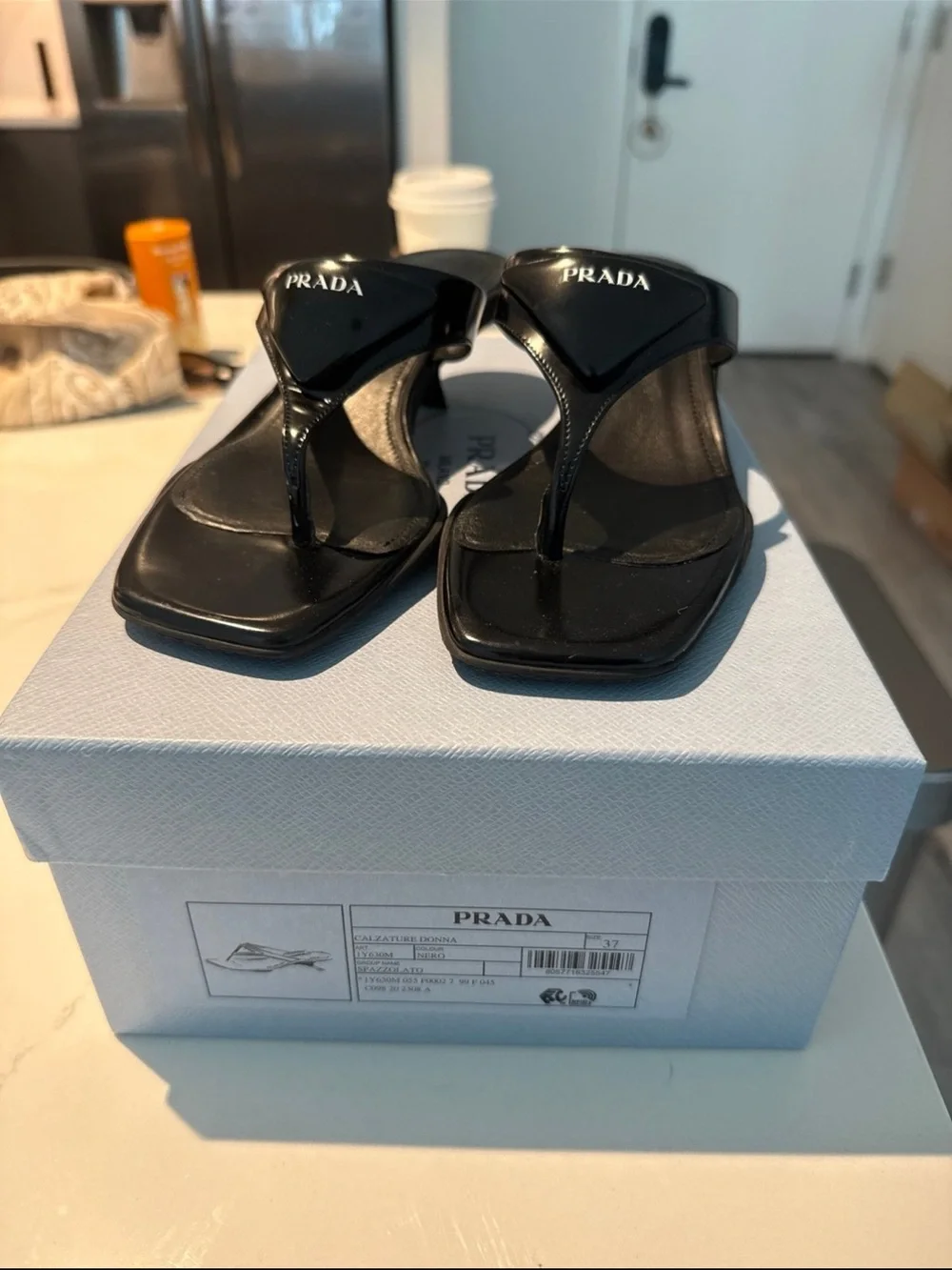 Prada strap definitely logo