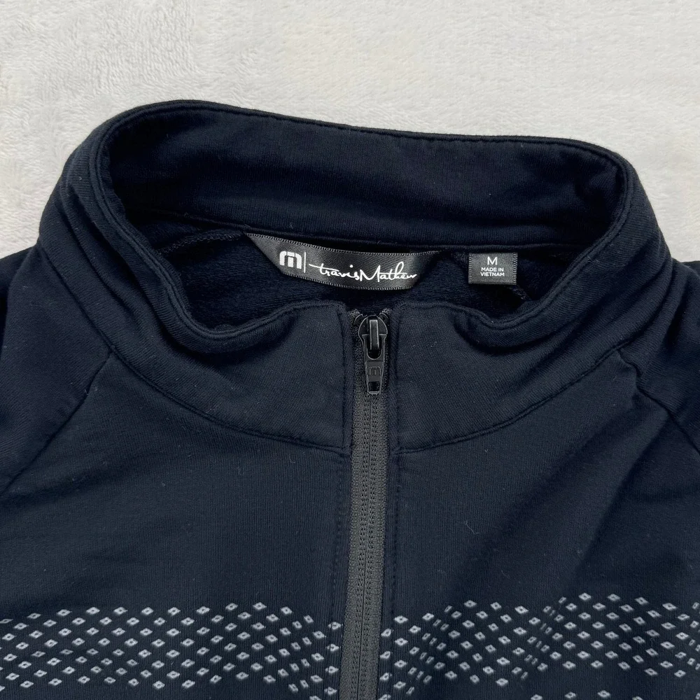 Travis Mathew cuffs collar