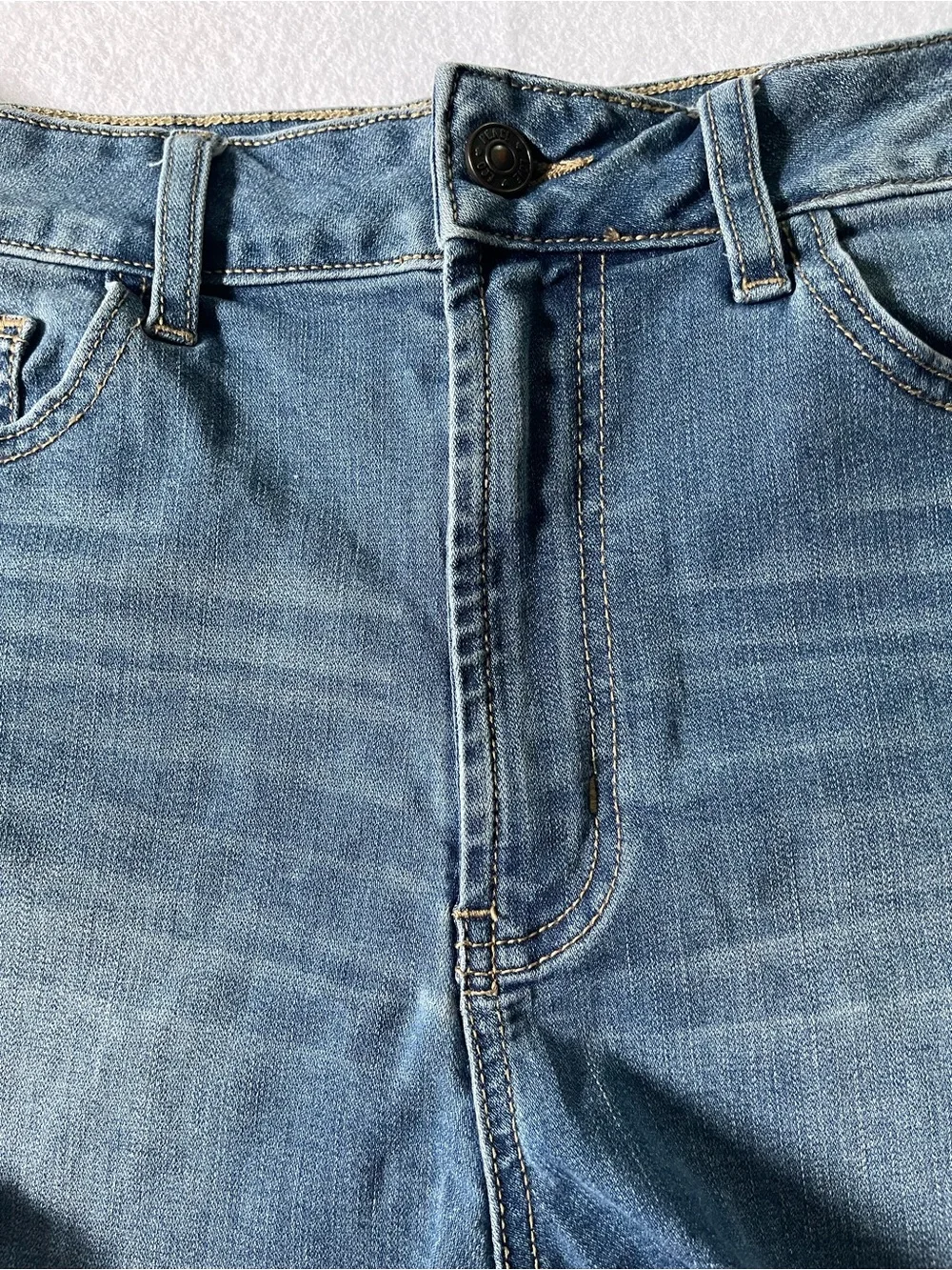 Rewash closure rise button