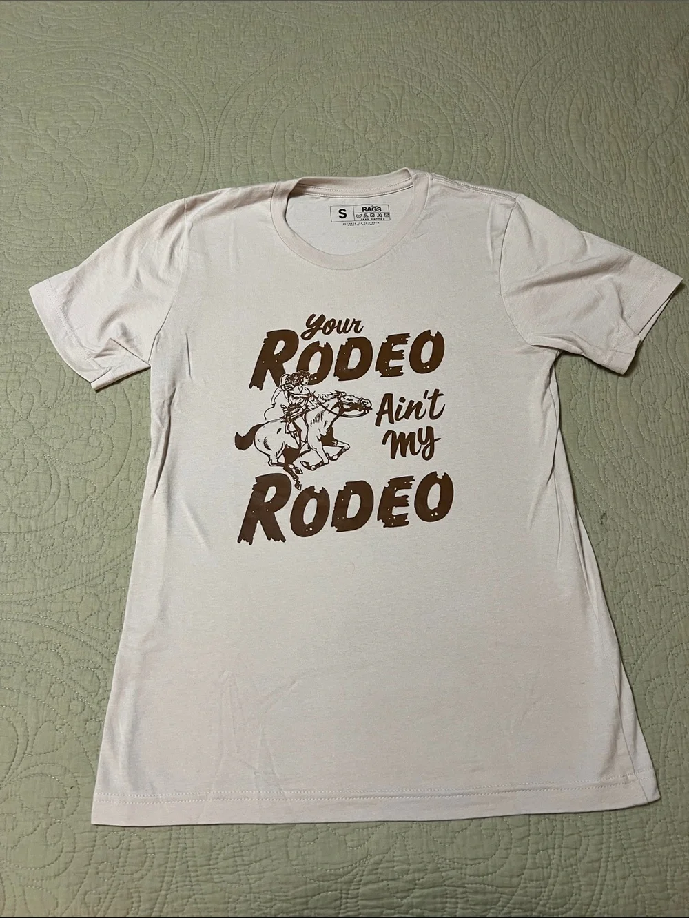 Your Rodeo Ain't My Rodeo Cream Graphic Tee