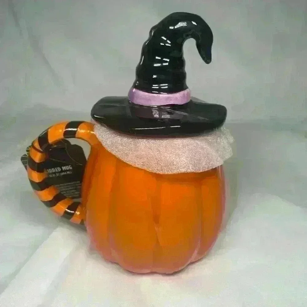 Halloween mug of a pumpkin‎ with witches hat lid