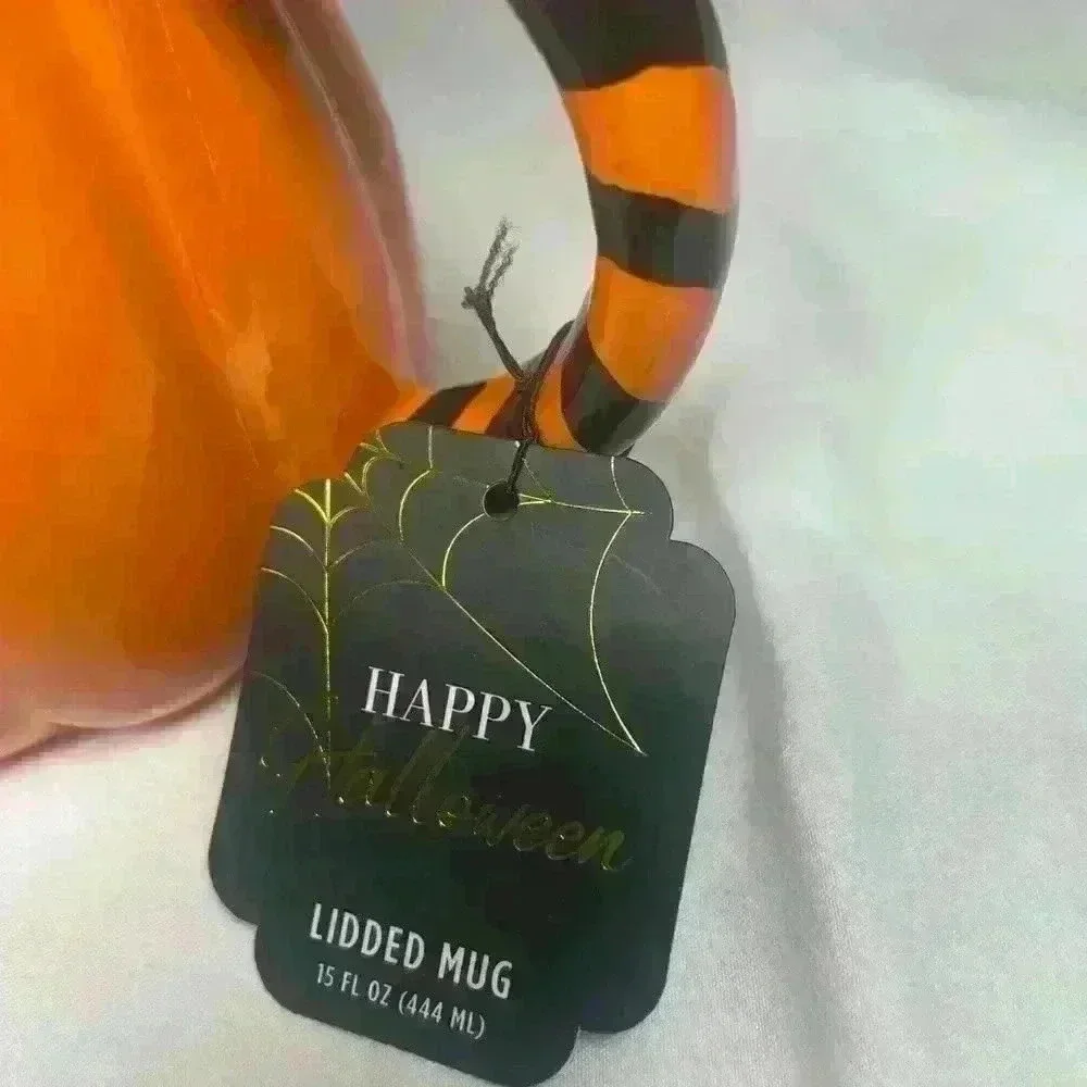 Halloween mug of a pumpkin‎ with witches hat lid