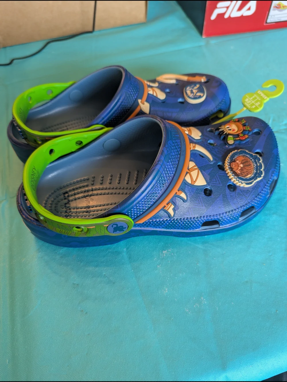 CROCS Kids Blue Clog Sandals with Green Heel Strap and Character Charms