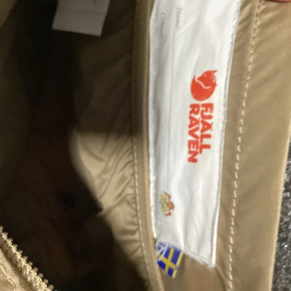 Fjallraven Tan Backpack with Iconic Design