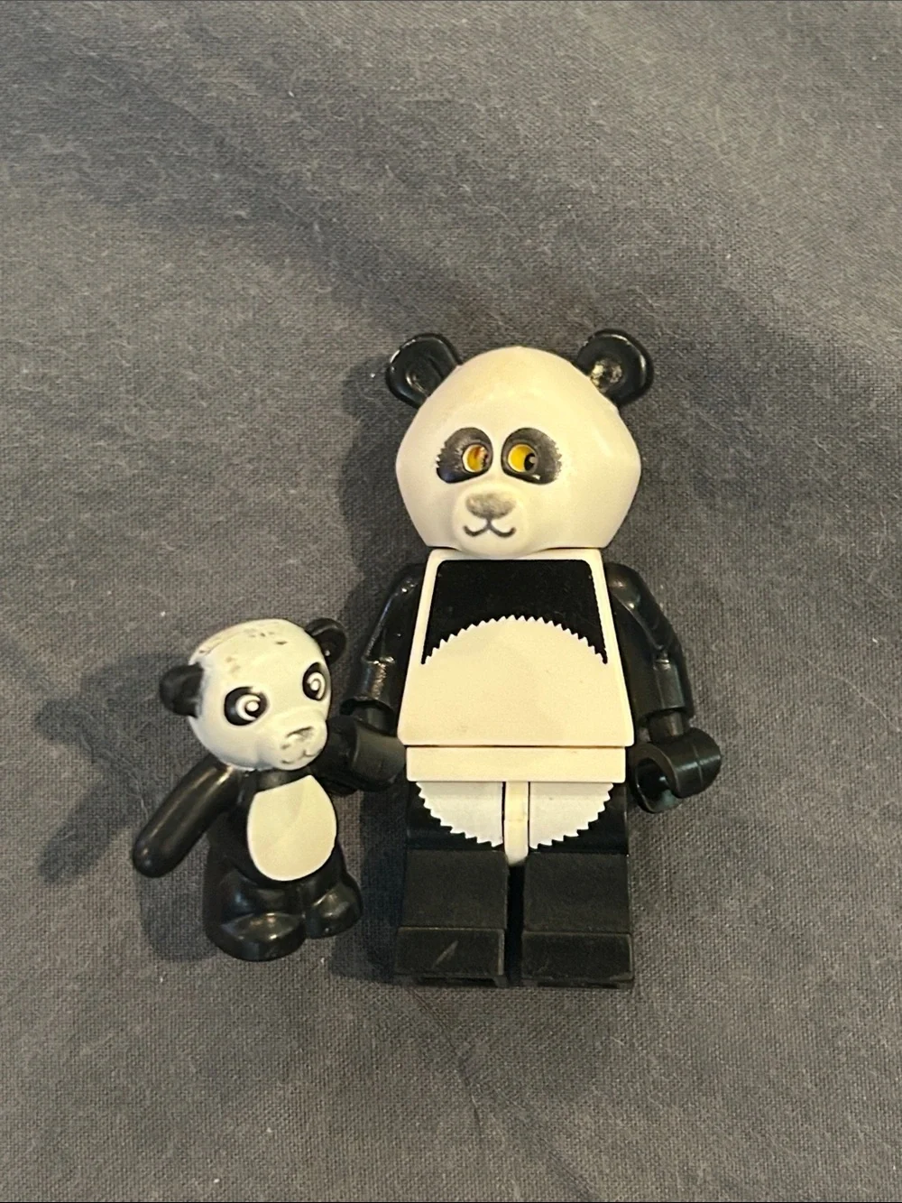 Lego panda costume minifigure with teddy bear