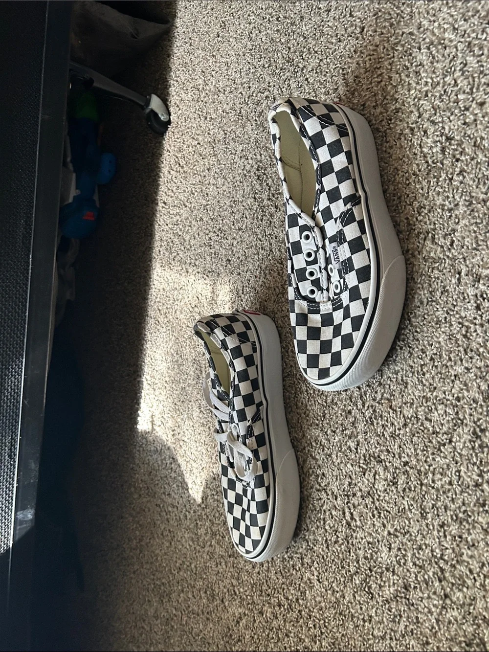 Vans Black and White Checkerboard Slip-On Sneakers