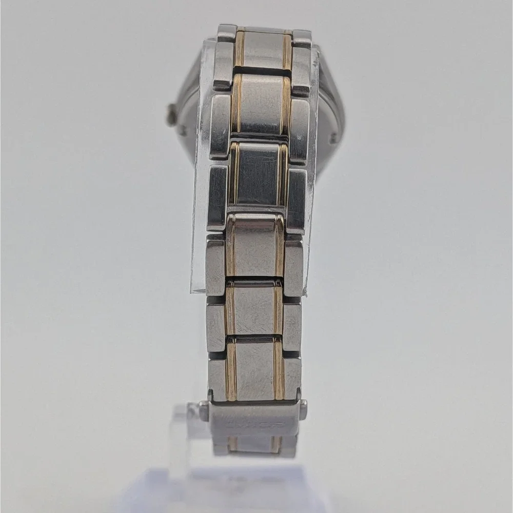 Seiko Solar V138-0AA0 Blue Sunburst Day/Date Two Tone Women's 25mm Watch