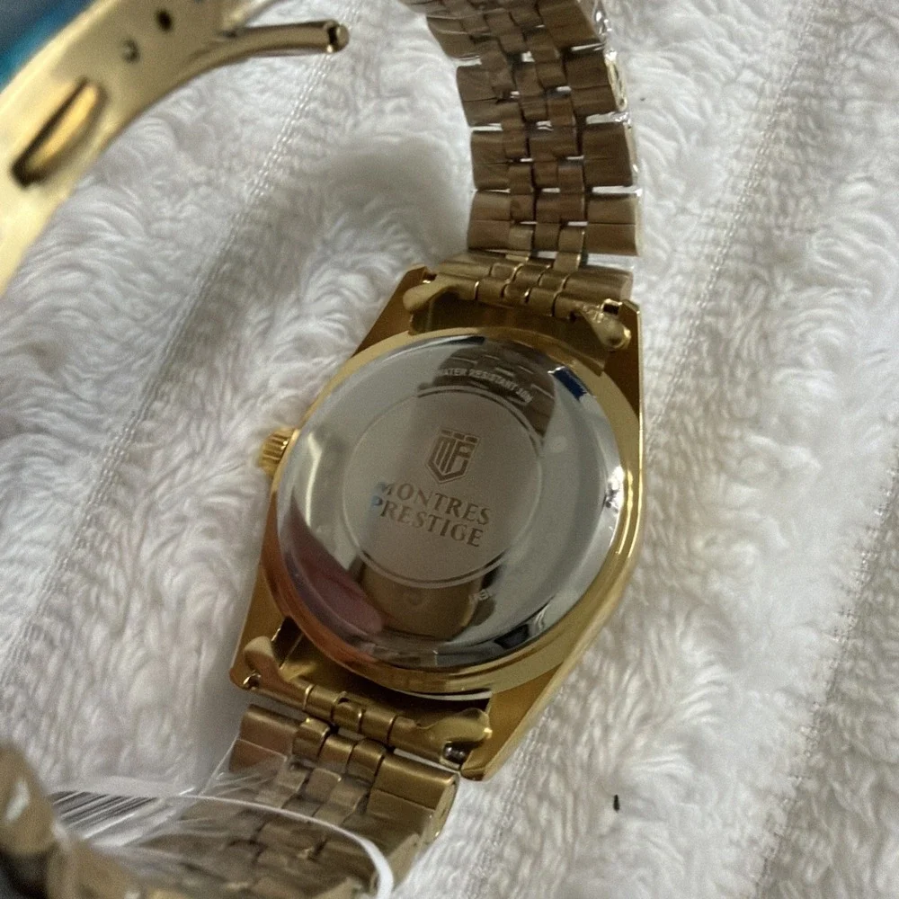 Montres Prestige by Invicta MPW-0269 Diamond Dial Gold-Tone 35mm Dress Watch
