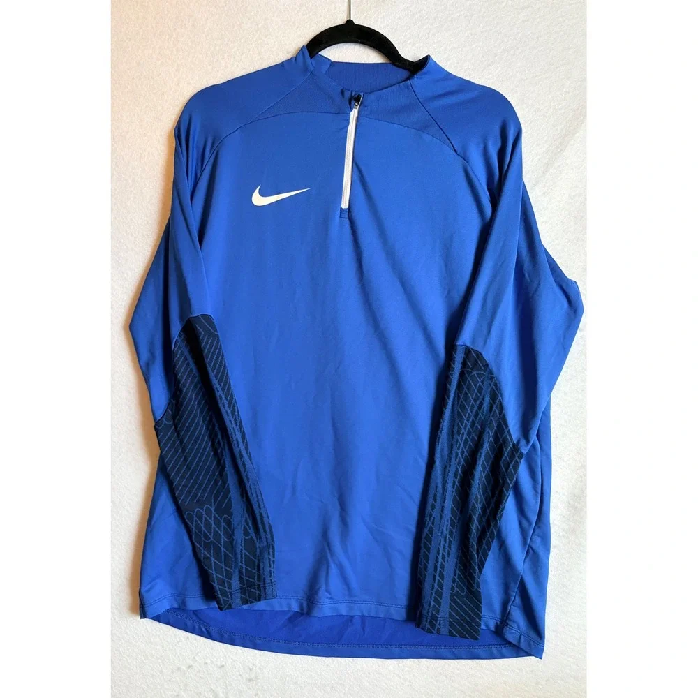 Nike department features zip