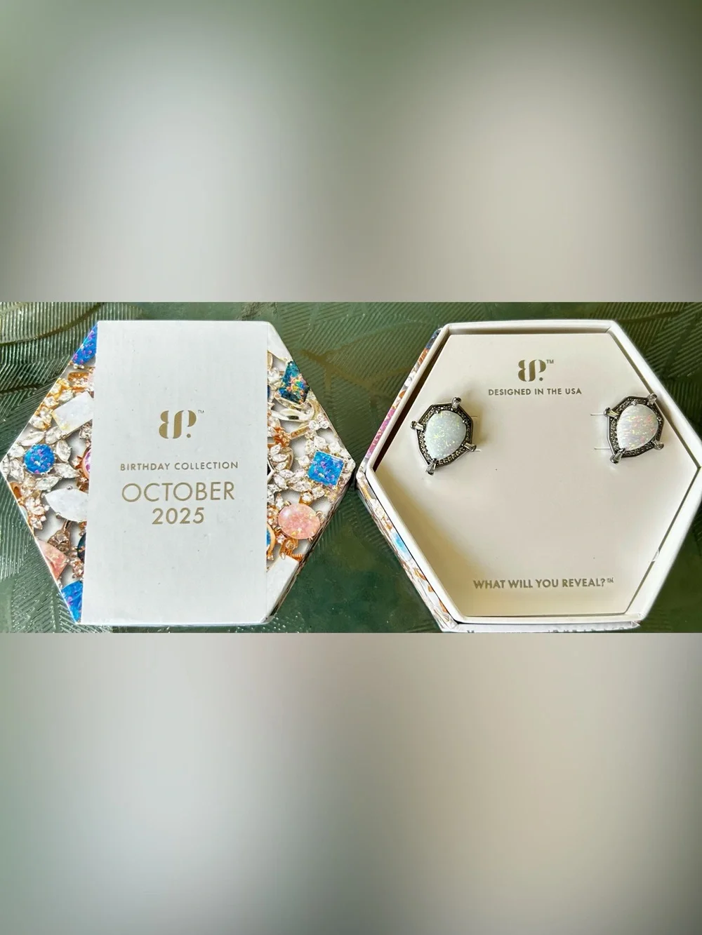 Bomb Party 2025 October earrings. Lab grown milky white opal on hematite plating