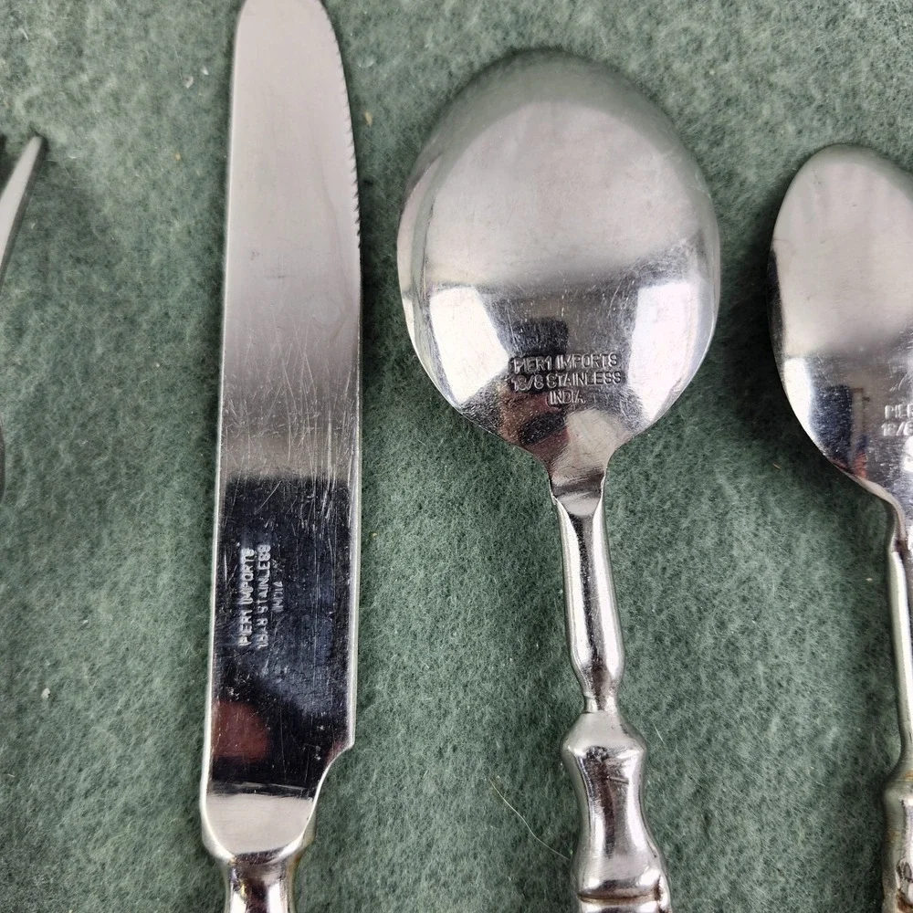 Pier 1 setting flatware some