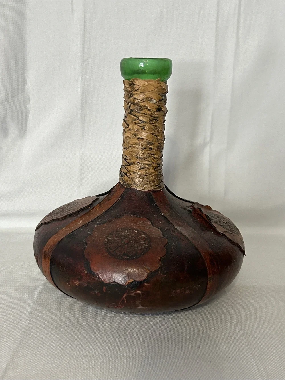 vintage Italian wine decanter covered in hand-tooled brown leather - no stopper