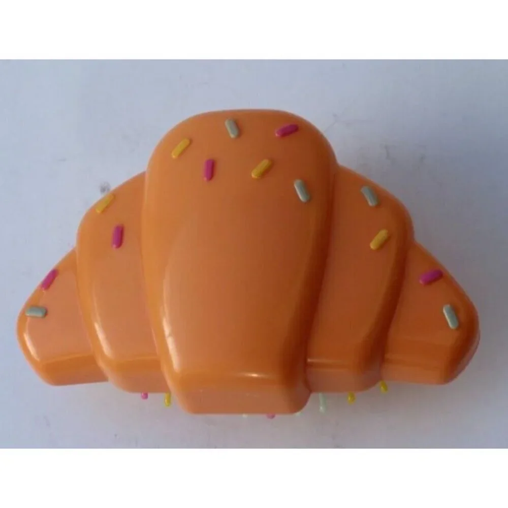 Brush croissant shaped