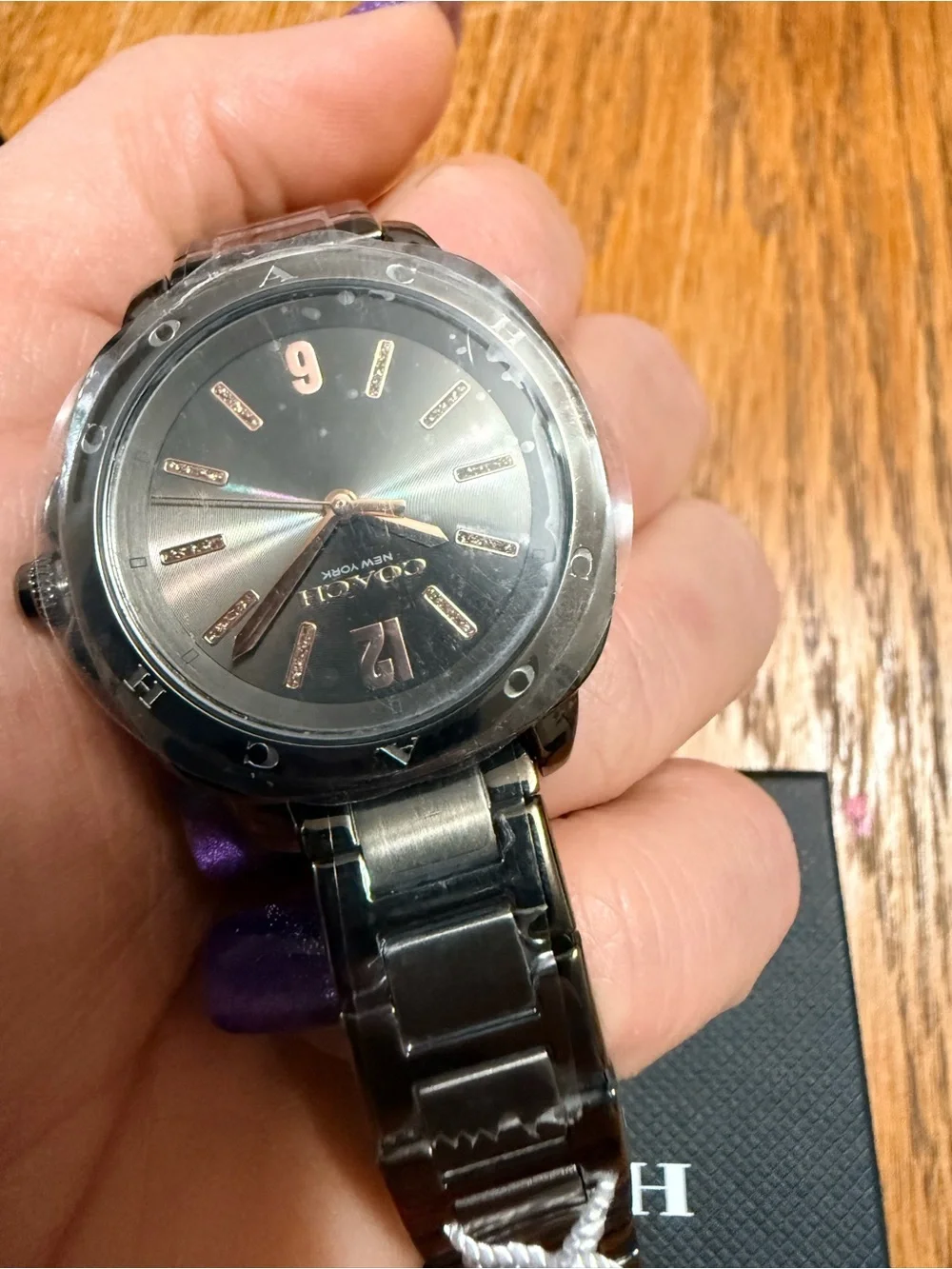 Coach polished silver