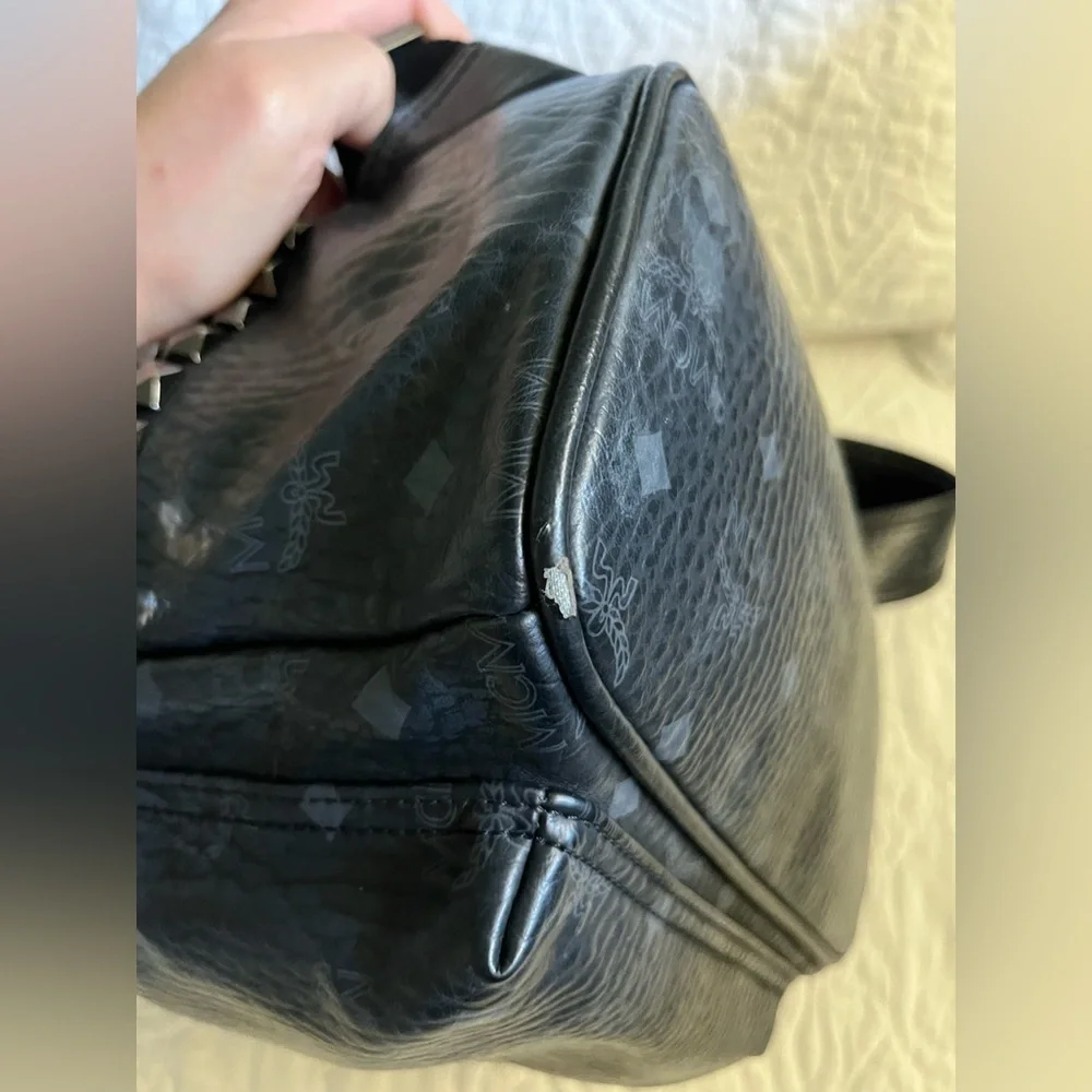Stark Side Studs Backpack In Visetos, black side pockets w/stud details leather