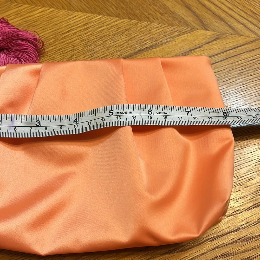 ✨ 3/$15 Estée Lauder Orange Tassel Makeup Bag