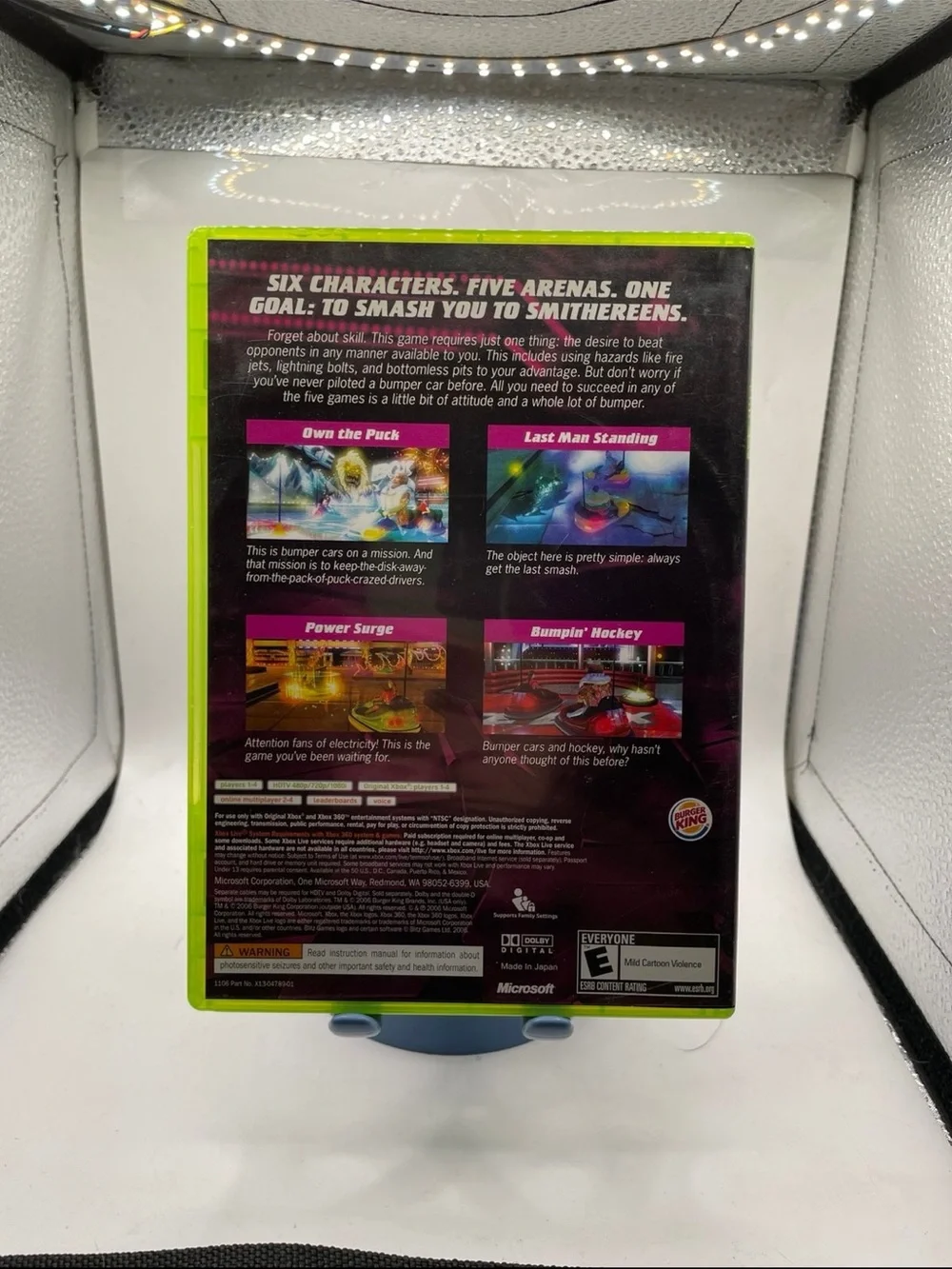 Microsoft Xbox Game with Neon Green Case and Pink Cover Art