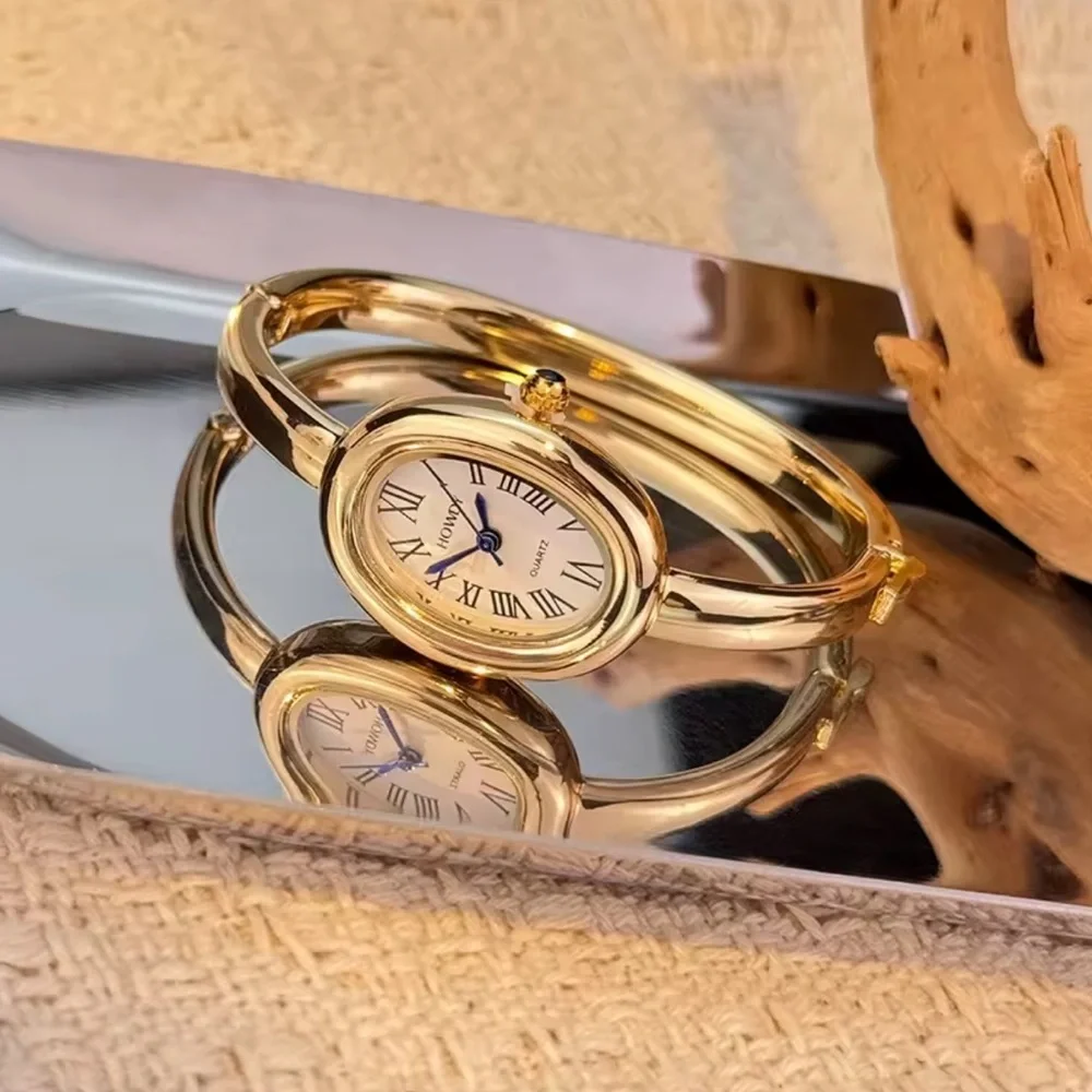 Anthropologie chic gold
