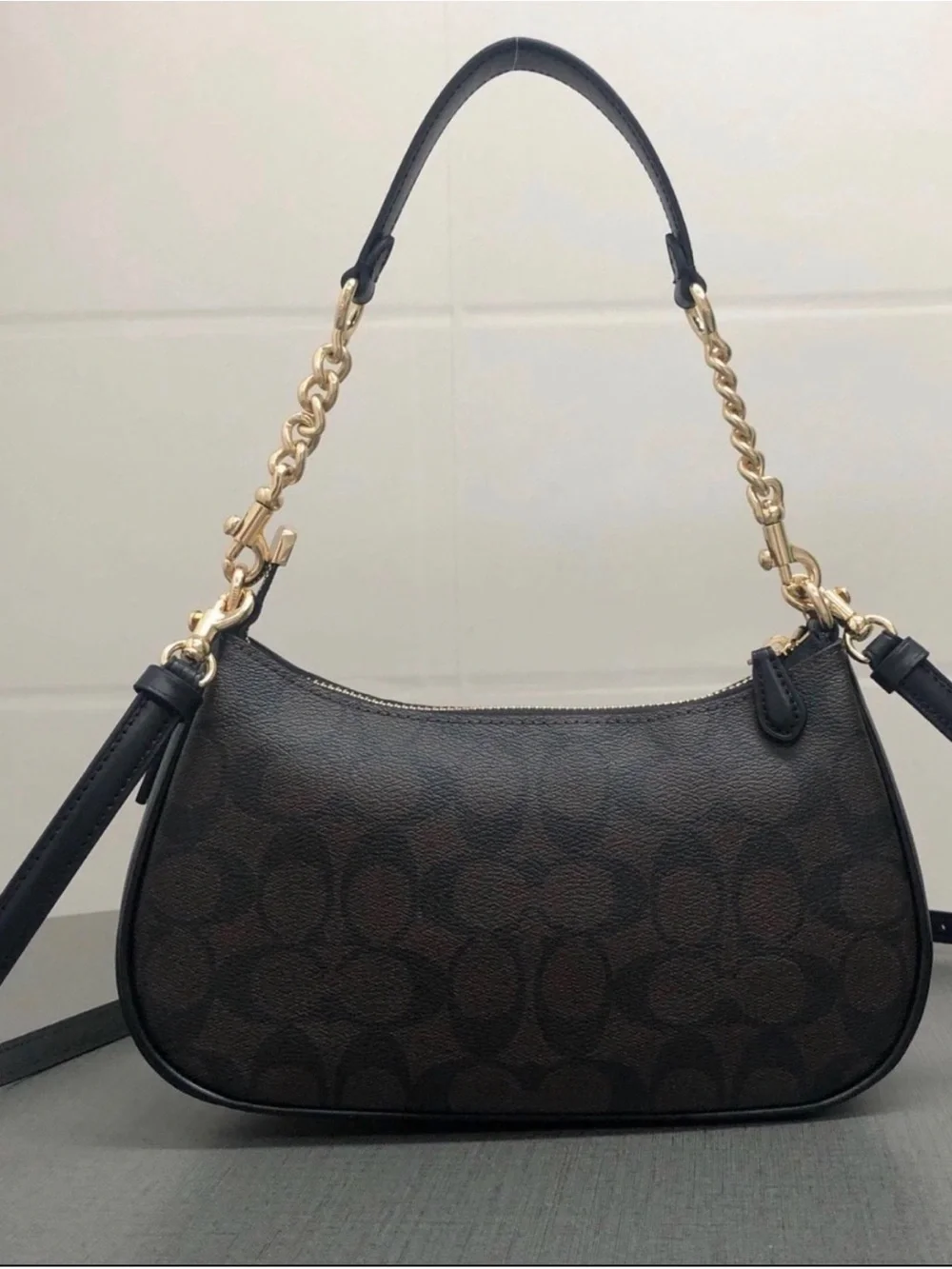 Coach accented top
