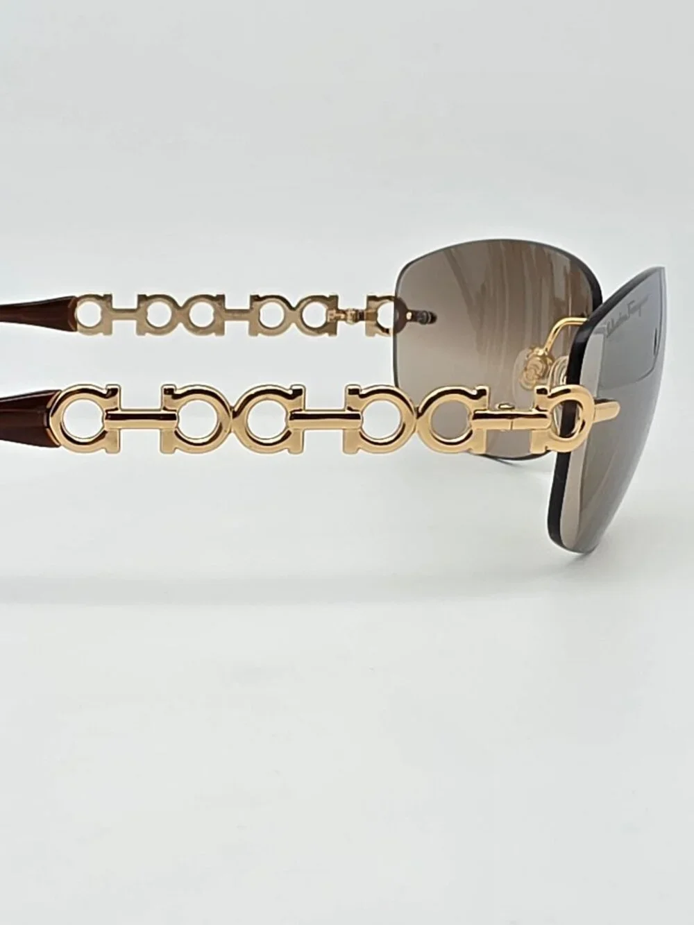 Salvatore Ferragamo 1055 Gold Gancini Frame Gold Mirror Rimless Sunglasses 61mm