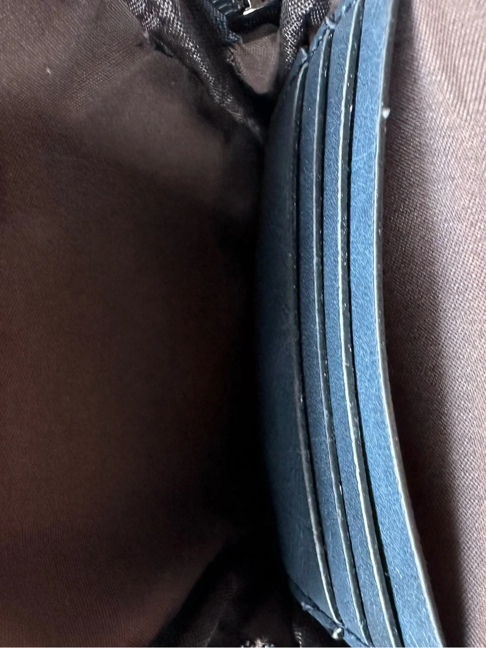 POIUGOYA navy leather