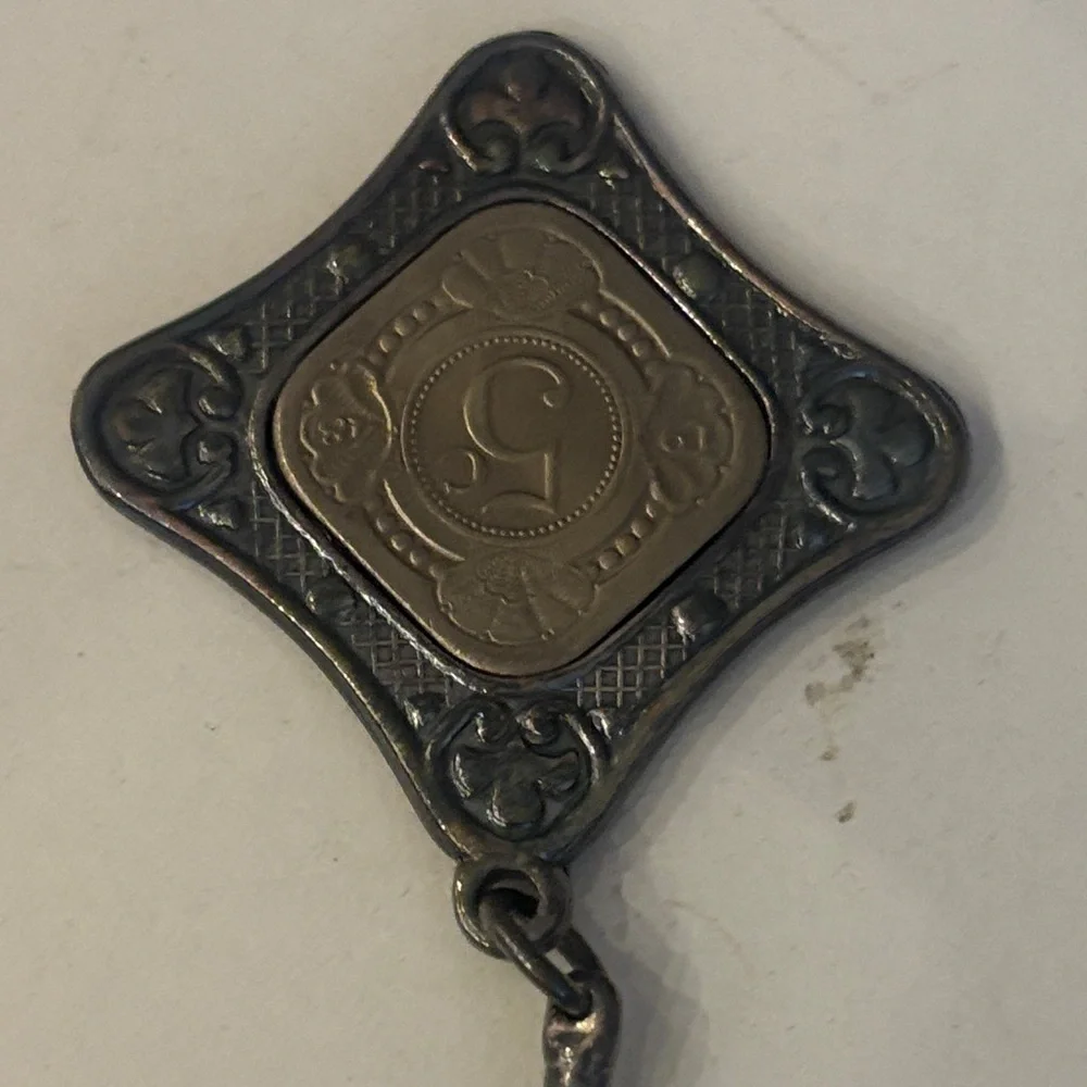 Key Chain featuring a 1943 Curaçao 5 cents coin set in a metal holder
