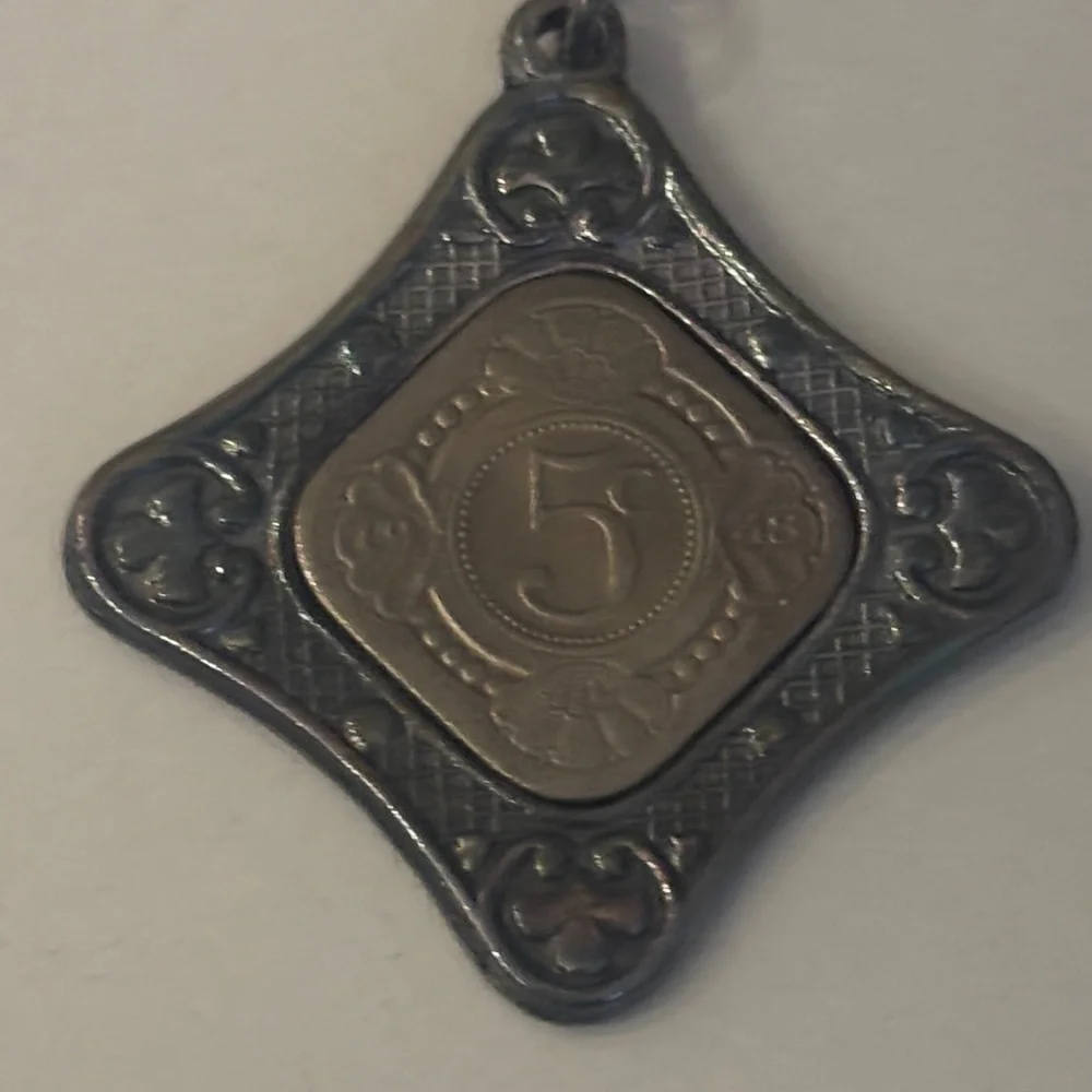 Key Chain featuring a 1943 Curaçao 5 cents coin set in a metal holder