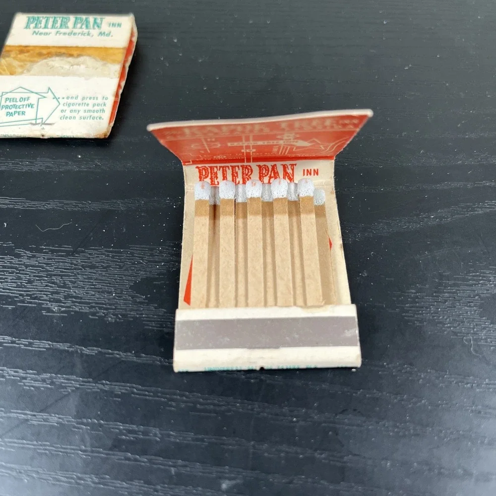 The‎ Kapok Tree Inn Matchbook with flaws