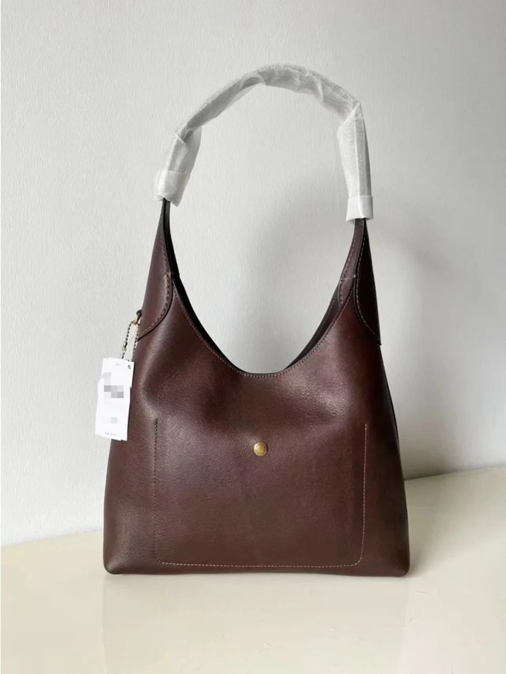 Coach sleek shoulder