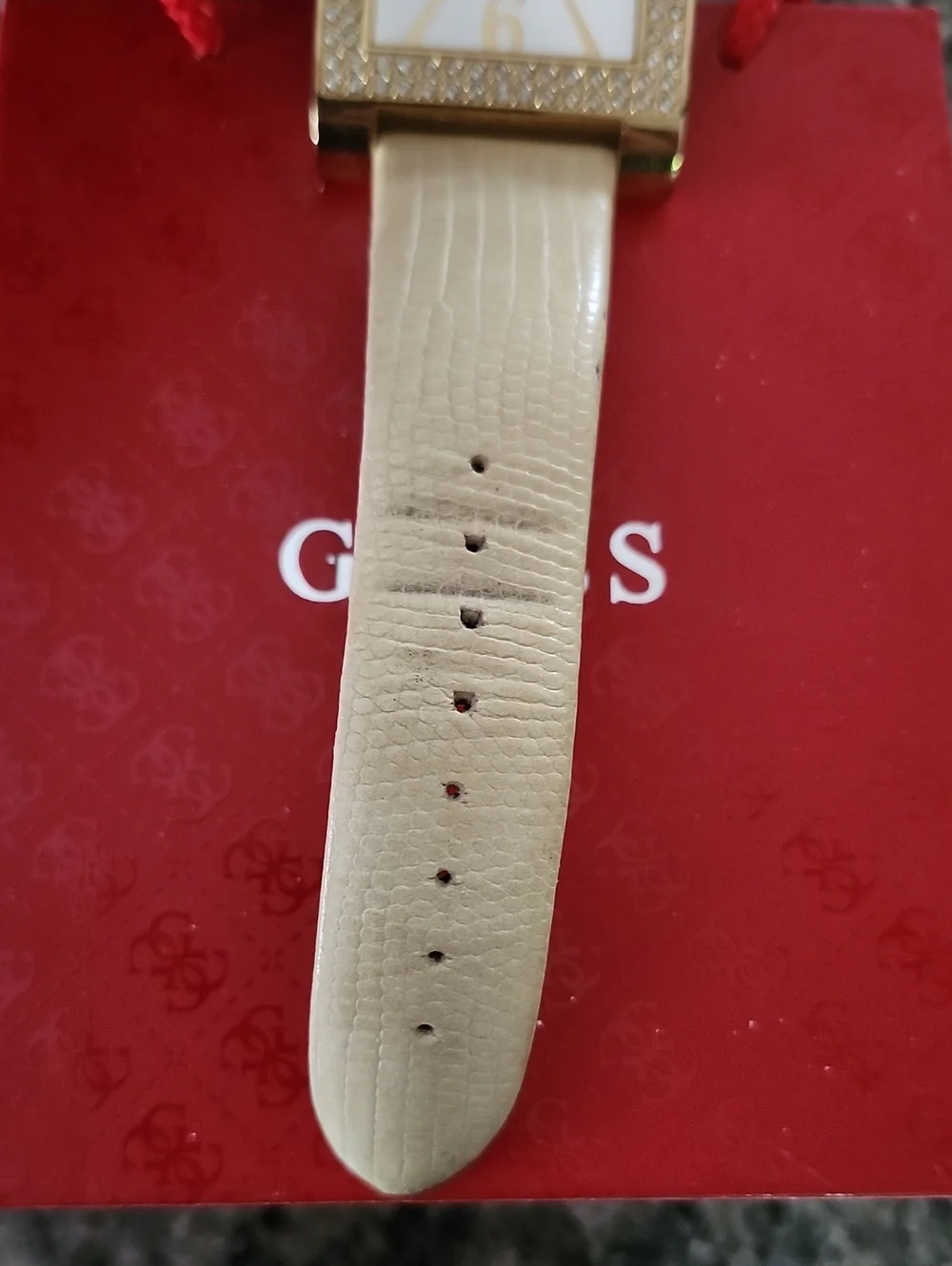 Guess Gold-Tone Swarovski Crystal-Trim Rectangular Watch with Cream Strap